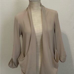 Have Taupe Ruched Cardigan.